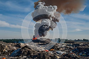 Landfill fire sends plumes of smoke billowing from burning garbage