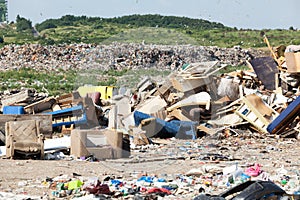Landfill. Old furniture at the garbage dump.