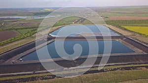 Landfill for solid waste of a thermal power plant. Aerial video of a crowded ash dump. Ash, slag, waste, landfill.