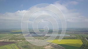 Landfill for solid waste of a thermal power plant. Aerial video of a crowded ash dump. Ash, slag, waste, landfill.