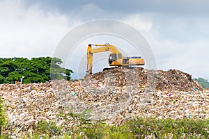 Landfill truck working on dumpsite