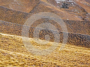 Landforms of mountains at Lindis Pass on the South Island of New Zealand photo