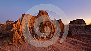 Sculpted landforms in the desert photo
