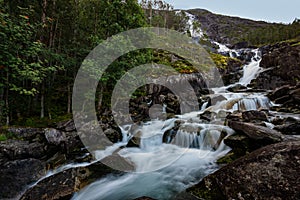 Landfoss Waterfall 2000 ft tall cascade flowing into Akrafjorden