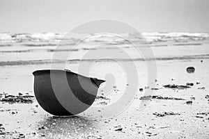 Landing beaches of june 6, 1944 in Normandy. Utah beach. Helmet of a parachutist on the sand. The longest day.