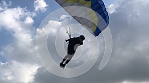 Landing. Parachutist lands on the ground. The whole world is open to extremals. The sky without borders.