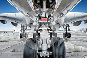 landing gear under a big jet plane