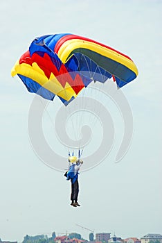 Landing parachutist photo