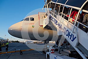 Landing passengers in a jet plane at the Rostov-on-Don Airport, Russia