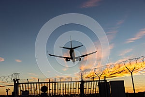 Landing plane over barbwire