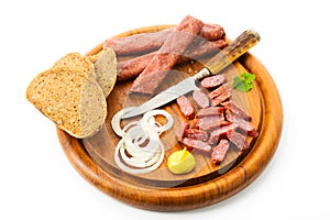 Landjaeger sausage, onion rings, mustard and bread