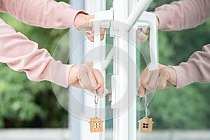 Landlord key for unlocking house is plugged into the door. Second hand house for rent and sale. Owner use hand unlock door