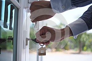 Landlord unlocks the house key for new home