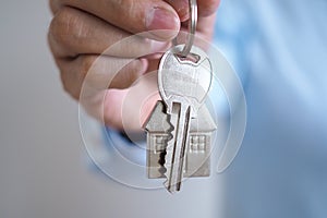 Landlord unlocks the house key for new home