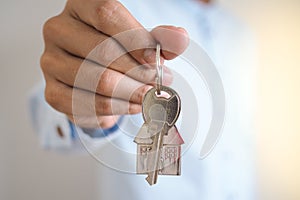 Landlord unlocks the house key for new home