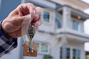 Landlord unlocks the house key for new home