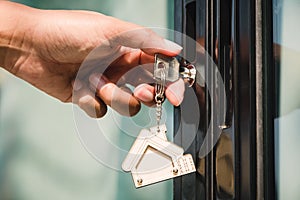 Landlord unlocks the house key for new house