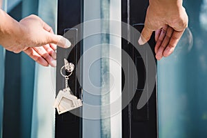 Landlord unlocks the house key for new house