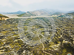 Landmannalaugar in Iceland highlands, drone view of hiking trail in mountains from above