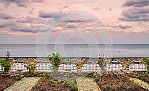 Landmark attraction in Bulgaria. Landscape with earth, water and dramatic sky. Black Sea from Botanical Garden - Balchik