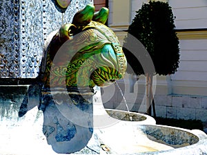 Landmark ceramic fountain scupper of ox head in Pecs, Hungary by the Zsolnay factory