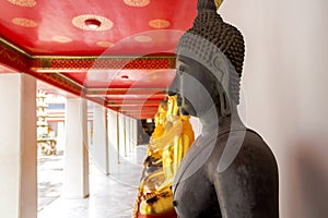 Landmark, Close Up Beautiful Black Buddha statue,standing Buddha statue,Golden statue Temple Wat Pho in Asia Bankok Thailand