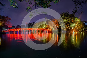 Landmark of Hanoi - The Huc Bridge and Hoan Kiem Lake in the night at Hanoi, Vietnam