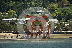 Landmark Shinto Shrine or Torii Gate of Itsukushima Shrine is on Miyajima Island in Hiroshima