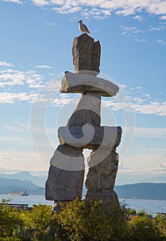 Landmark Vancouver Inukshuk sculpture seagull