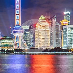 Landmarks of Shanghai with Huangpu river at night