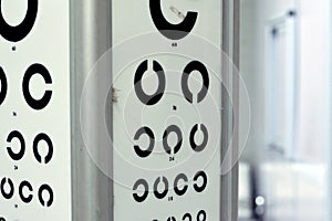 Landolt C broken ring optotypes or Japanese vision test in various sizes and orientations, an eye chart used for testing vision