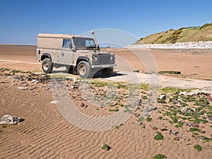 Landrover Jeep on Beach photo