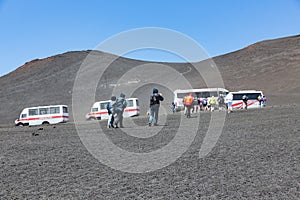 Landrovers ands tourists visiting Mount Etna of island Sicily, Italy