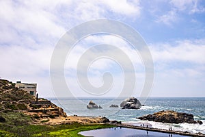 Lands End California Rocky beach with White Building on Coast
