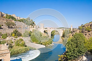 Landscape of Alcantara bridge in Toledo and river Tagu