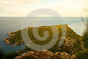 Landscape of alcudia park in palma de mallorca from mirador penya del migdia with sea. quiet landscape of mallorca at sunset photo