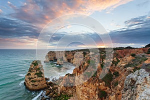 Landscape on the Algarve coast at sunset. Beach in southern Portugal