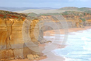 Landscape with cliffs in the mist, Great Ocean Road, Victoria, Australia photo