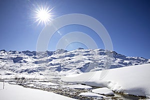 Landscape of Alps mountains in winter close to Lac du Lou, Val Thorens, France