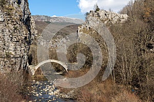 Landscape of Ancient Bridge of Kontodimos or Lazaridis in Vikos gorge and Pindus Mountains, Zagori, Epirus, Greece