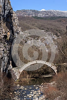 Landscape of Ancient Bridge of Kontodimos or Lazaridis in Vikos gorge and Pindus Mountains, Zagori, Epirus, Greece