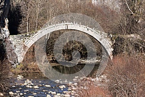 Landscape of Ancient Bridge of Kontodimos or Lazaridis in Vikos gorge and Pindus Mountains, Zagori, Epirus, Greece