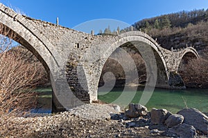 Landscape of Ancient Bridge of Missios in Vikos gorge and Pindus Mountains, Zagori, Epirus, Greece