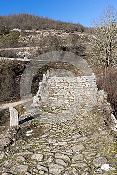 Landscape of Ancient Bridge of Missios in Vikos gorge and Pindus Mountains, Zagori, Epirus, Greece