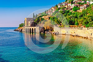 Landscape of ancient shipyard near of Kizil Kule tower in Alanya peninsula, Antalya district, Turkey, Asia. Famous tourist photo