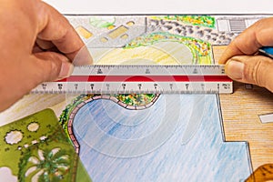 Landscape architect student learning garden plan design by hand drawing