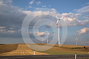 Landscape with asphalt road  with wind mill farm near byria