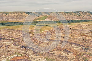 Landscape of the Badlands of Drumheller with an overcast sky