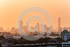 Landscape of Bangkok with pollution in the sky at sunset