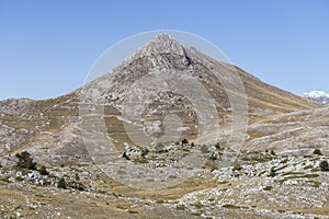 Barren slopes and Camicia peak, near Capo la Serra pass, Abruzzo, Italy photo